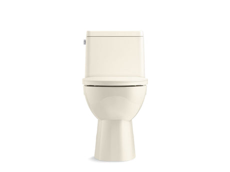 One-piece compact elongated toilet with skirted trapway, 1.28 gpf